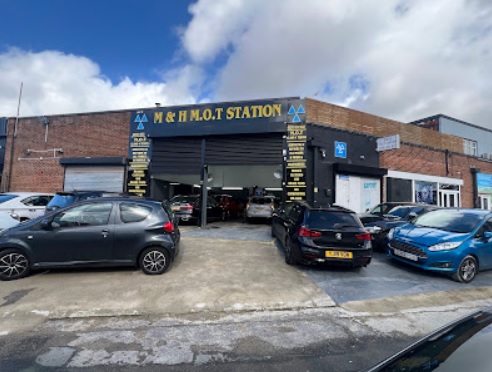 M and H MOT Station Logo
